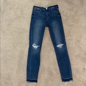 Garage skinny jeans with rips size 01.